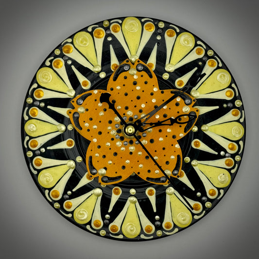 Art Clock on 45 Vinyl Record, Orange and Yellow Star Burst with Flower Wood Inlay